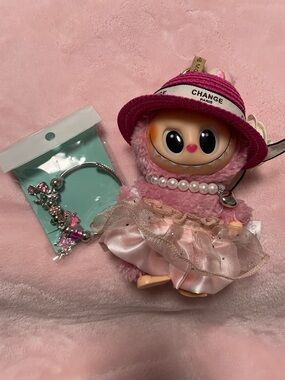 Lychee Berry Macaroon Labubu with unbranded outfit and unbranded bracelet